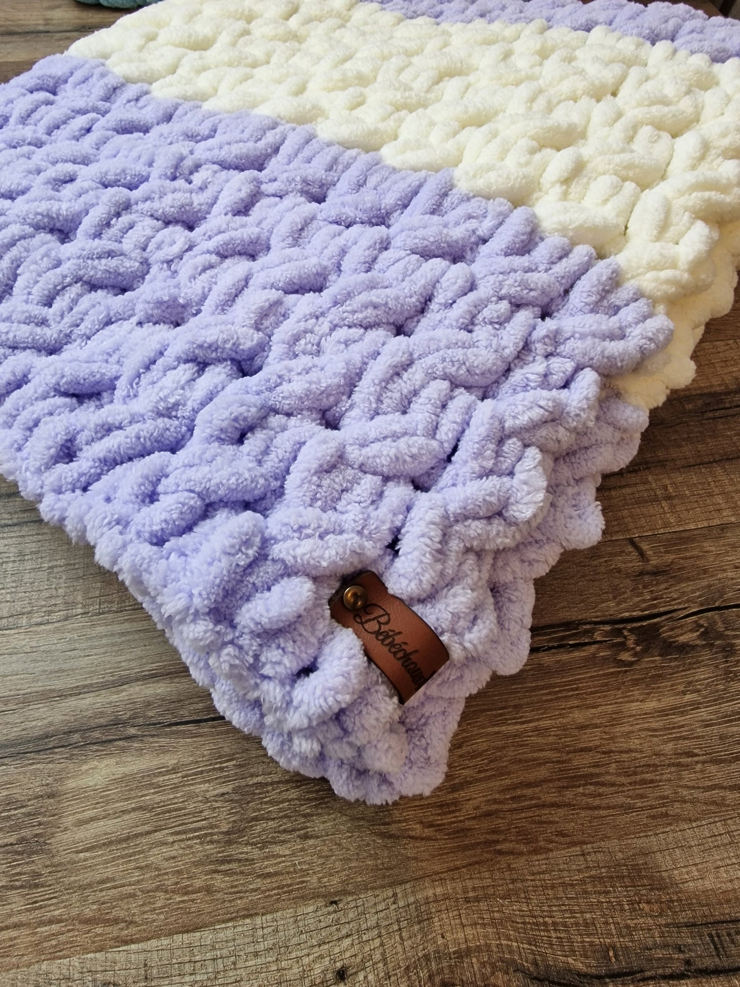 Couverture bicolore torsadée