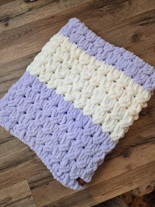 Couverture bicolore torsadée